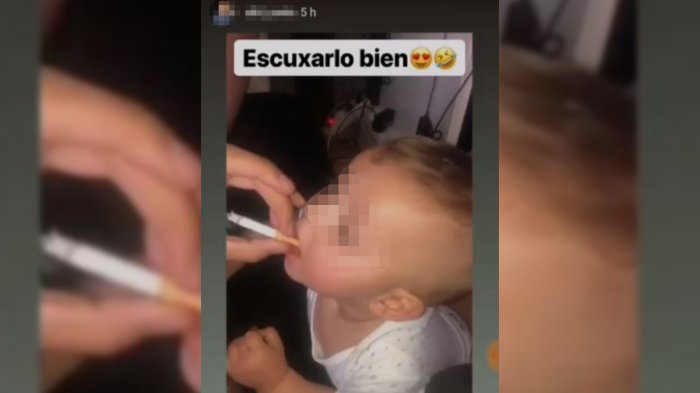 Impacto por video donde bebé de 11 meses aparece fumando un cigarro: Su madre se lo dio