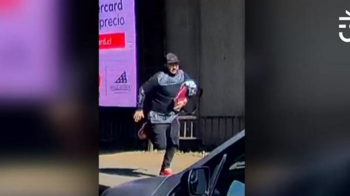 Impacto por registro que muestra a sujeto asaltando a una conductora en Las Condes