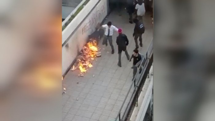 Graban a presidente del centro de alumnos del IN encarando a encapuchados que prendían fuego en el recinto