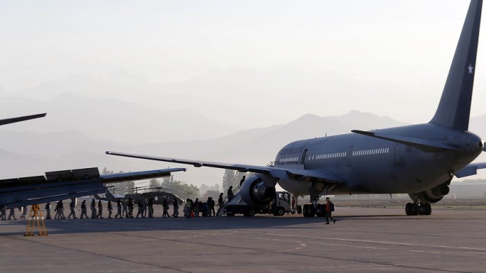 Expulsan del país a 56 ciudadanos extranjeros: Algunos fueron acusados de participar en saqueos