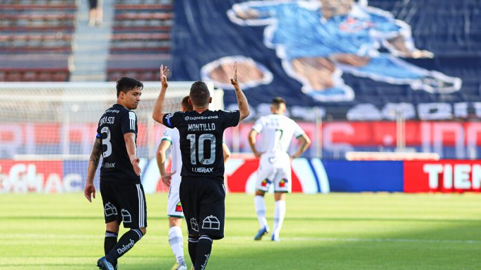 Poleras negras y un enorme lienzo con su imagen: Los homenajes de la U a Carlos 