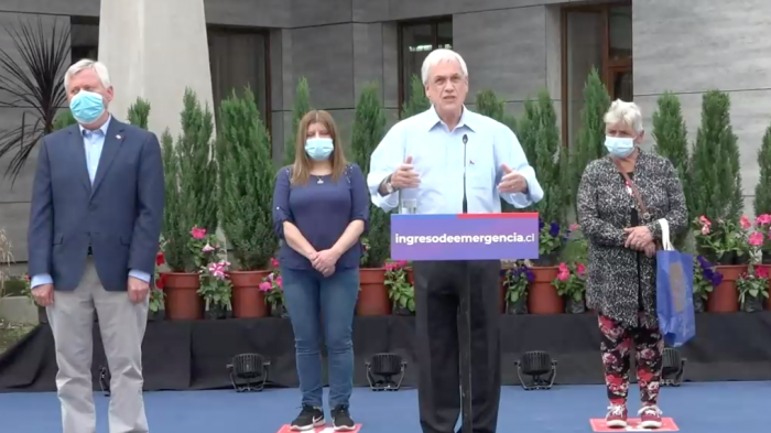 Piñera e inmigrantes en Colchane: 