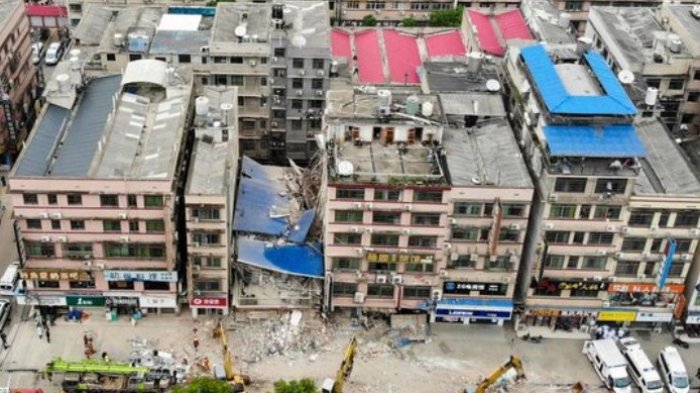 Más de 30 personas desaparecidas y decenas quedan atrapadas tras derrumbe de un edificio en China