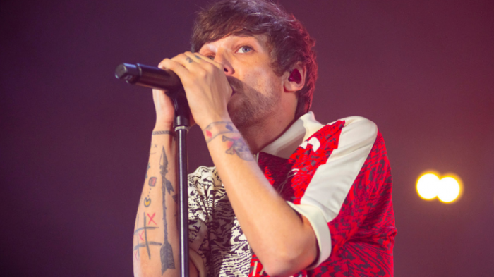 Denuncian trato agresivo de guardias: Louis Tomlinson tuvo que pausar su último concierto en Santiago