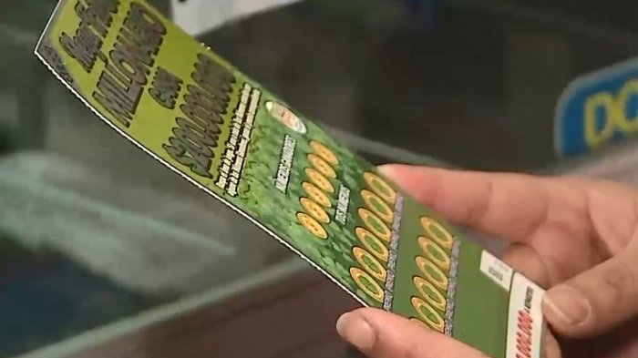 Premio era de $200 millones: Polla se querella contra mujer por presuntamente adulterar raspe ganador