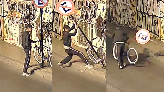 Derribó la señalética y se fue pedaleando: Registran insólito robo de bicicleta en Santiago Centro