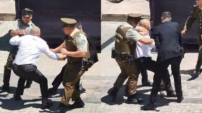 Captan a hombre saltando barreras de protección en funeral de Sebastián Piñera: Carroza pasaba por La Moneda