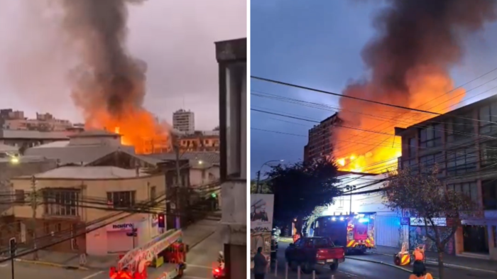 Reportan violento incendio en locales comerciales en el centro de Concepción