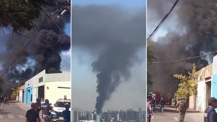 Alerta por gran columna de humo en Santiago: Bomberos combaten incendio estructural